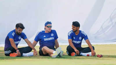 Morne Morkel engaging in lighthearted wrestling with Arshdeep Singh and Akash Deep