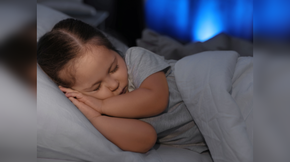 Child sleeping peacefully, ensuring a productive day ahead.